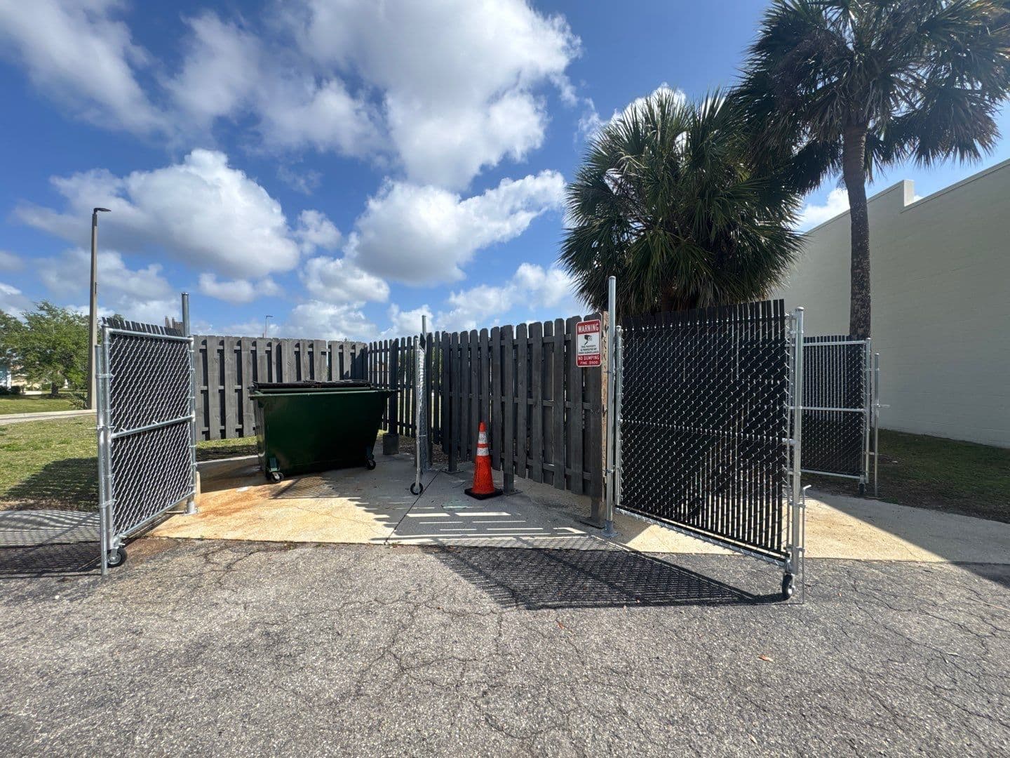 black_vinyl_coated chain link fence installation in FORT MYERS, FL
