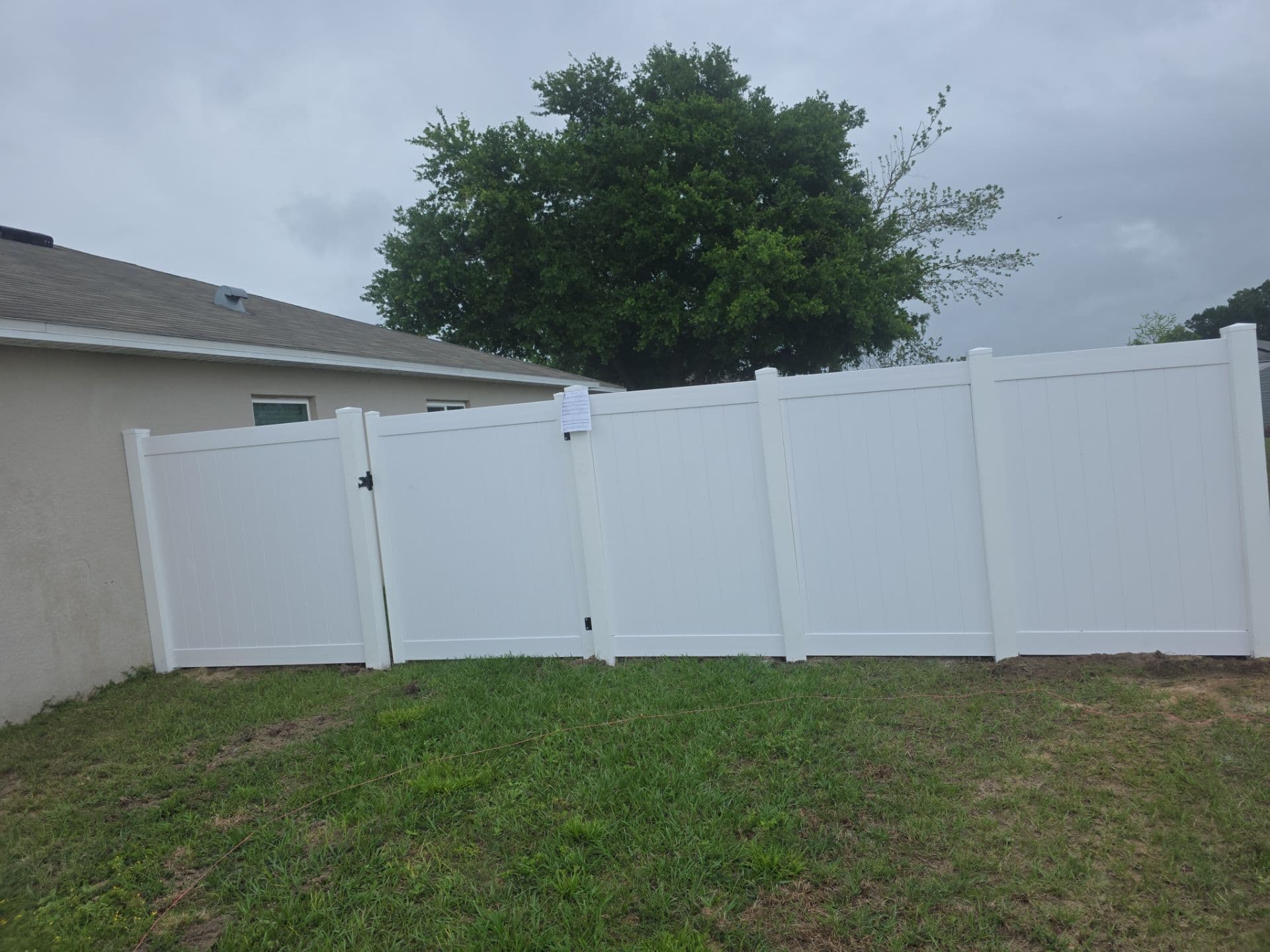 Vinyl fence installation by ASAP Fence & Gates near Esplanade at Artisan Lakes, FL